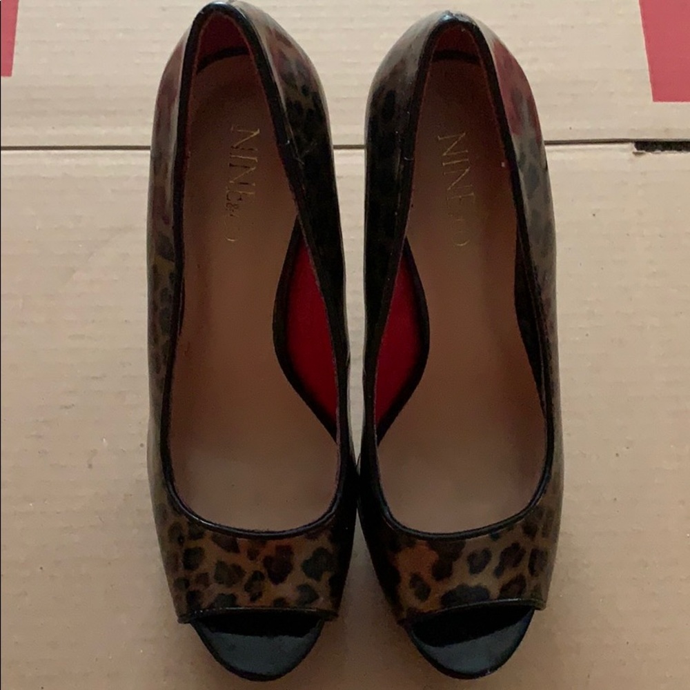 Leopard print peep toe pumps with studded heel